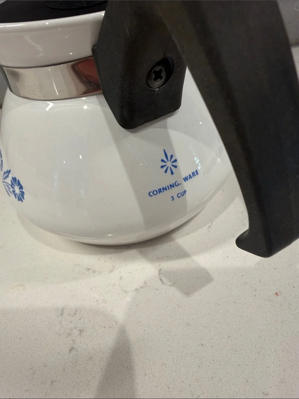 White Ceramic Corningware Teapot with Blue Floral Design and Black Handle